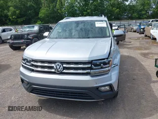 2018 Volkswagen Atlas SE z VIN 1V2DR2CAXJC521412, wystawiony jako IAAI lot #42309661 z przebiegiem 99 045 mil mil oraz . Historia ofert i sprzedaży dostępna na DreamBid. Obrazek 12.
