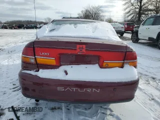 2002 Saturn LS z VIN 1G8JS54F12Y587561, wystawiony jako Copart lot #44496745 z przebiegiem Nie podano mil oraz Szkody całkowita. Historia ofert i sprzedaży dostępna na DreamBid. Obrazek 6.