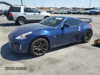 2016 Nissan 370Z Nismo z VIN JN1AZ4EH9GM933658, wystawiony jako Copart lot #48760215 z przebiegiem 70 682 mil mil oraz Szkoda całkowita • Salvage title. Historia ofert i sprzedaży dostępna na DreamBid. Obrazek 1.