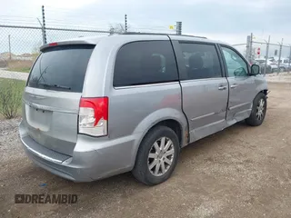 2015 Chrysler Town & Country Touring with VIN 2C4RC1BG0FR706902, listed as a IAAI auction lot 42079036 with 316,041 mi miles. Bid and sale history available at carsss.com. Image 4.