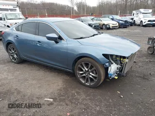 2017 Mazda 6 Grand Touring with VIN JM1GL1X52H1109210, listed as a IAAI auction lot 41738041 with 127,585 mi miles. Bid and sale history available at carsss.com. Image 1.