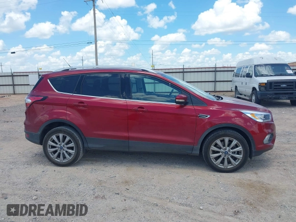 2018 Ford Escape Titanium with VIN 1FMCU0J96JUD58854, listed as a IAAI auction lot 42590609 with 77,825 mi miles and . Bid and sale history available at DreamBid. Image 13.