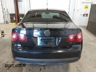 2008 Volkswagen Jetta Sedan S with VIN 3VWJM71K78M153658, listed as a IAAI auction lot 41709377 with 144,467 mi miles. Bid and sale history available at carsss.com. Image 16.