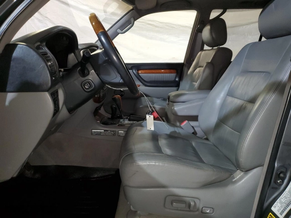 2003 Lexus LX 470 with VIN JTJHT00W333535208, listed as a Copart auction lot 88212525 with 147,083 mi miles and Clean Title. Bid and sale history available at carsss.com. Image 7.
