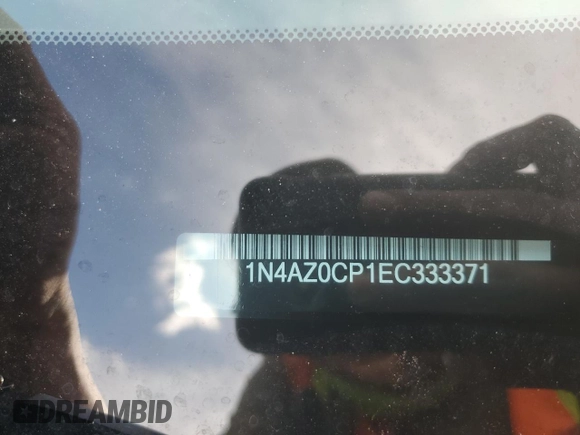 2014 Nissan LEAF SV z VIN 1N4AZ0CP1EC333371, wystawiony jako Copart lot #55648645 z przebiegiem 71 414 mil mil oraz Szkoda całkowita • Salvage title. Historia ofert i sprzedaży dostępna na DreamBid. Obrazek 12.