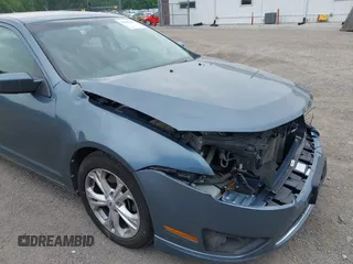2012 Ford Fusion SE z VIN 3FAHP0HAXCR200826, wystawiony jako IAAI lot #42448447 z przebiegiem 109 439 mil mil oraz . Historia ofert i sprzedaży dostępna na DreamBid. Obrazek 15.
