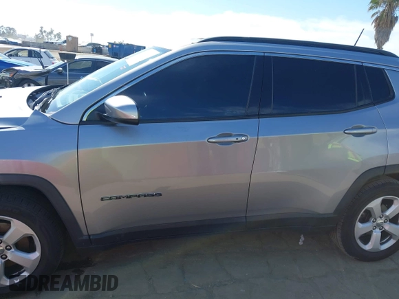 2019 Jeep Compass Latitude with VIN 3C4NJCBB0KT676974, listed as a IAAI auction lot 42020893 with 54,159 mi miles and . Bid and sale history available at DreamBid. Image 14.