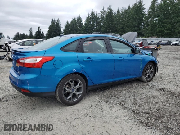 2013 Ford Focus SE with VIN 1FADP3F25DL295338, listed as a Copart auction lot 60225485 with 82,979 mi miles and Salvage title. Bid and sale history available at DreamBid. Image 3.