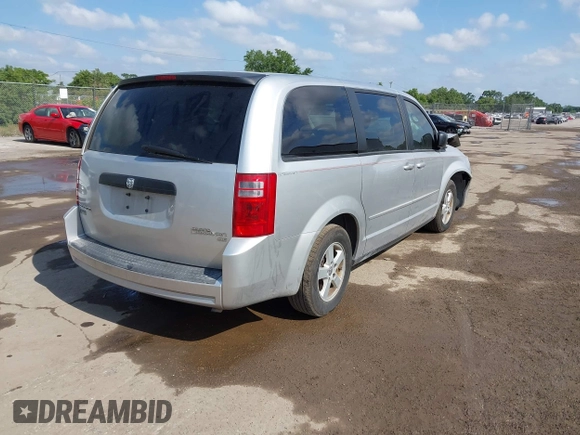2010 Dodge Grand Caravan SE with VIN 2D4RN4DE0AR125435, listed as a IAAI auction lot 40681039 with 193,424 mi miles and . Bid and sale history available at DreamBid. Image 4.