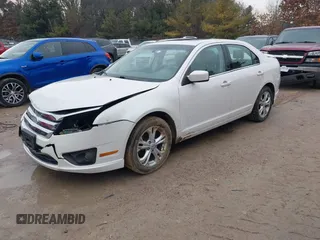 2012 Ford Fusion SE with VIN 3FAHP0HAXCR430866, listed as a IAAI auction lot 41676183 with 128,049 mi miles and . Bid and sale history available at DreamBid. Image 2.