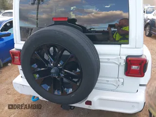 2021 Jeep Wrangler Unlimited Sahara with VIN 1C4JJXP64MW840094, listed as a IAAI auction lot 40830676 with 31,716 mi miles and . Bid and sale history available at DreamBid. Image 17.