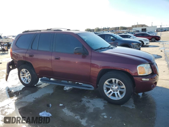 2003 GMC Envoy SLT with VIN 1GKDT13S732378731, listed as a Copart auction lot 88340825 with 125,814 mi miles and Salvage Title. Bid and sale history available at carsss.com. Image 4.