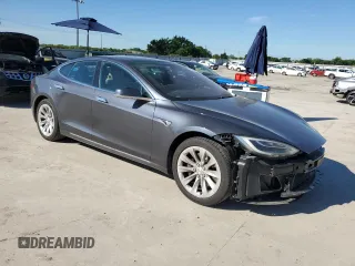 2017 Tesla Model S 60 with VIN 5YJSA1E14HF184188, listed as a Copart auction lot 55836495 with 94,623 mi miles and Salvage title. Bid and sale history available at DreamBid. Image 4.
