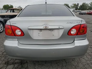 2004 Toyota Corolla CE with VIN 1NXBR32E34Z297414, listed as a Copart auction lot 52541105 with 147,072 mi miles and Salvage Title. Bid and sale history available at DreamBid. Image 6.