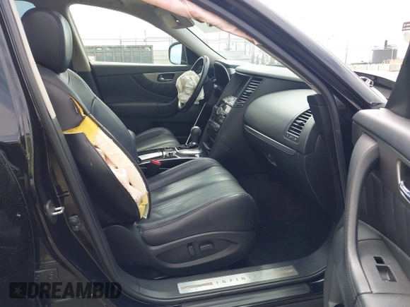 2014 Infiniti QX70 z VIN JN8CS1MW6EM410091, wystawiony jako IAAI lot #41896327 z przebiegiem 139 021 mil mil oraz . Historia ofert i sprzedaży dostępna na DreamBid. Obrazek 5.