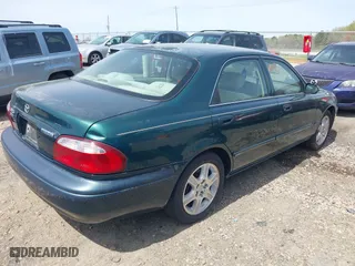 2001 Mazda 626 LX with VIN 1YVGF22D915241384, listed as a IAAI auction lot 41927705 with 231,801 mi miles. Bid and sale history available at carsss.com. Image 4.