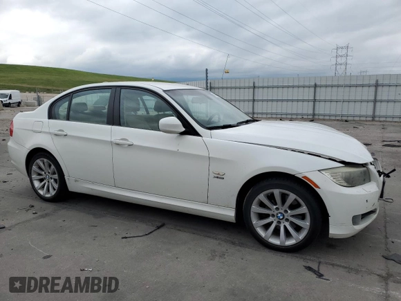 2011 BMW 3 Series 328i xDrive with VIN WBAPK7G5XBNN86258, listed as a Copart auction lot 61224485 with 202,186 mi miles and Salvage title. Bid and sale history available at DreamBid. Image 4.