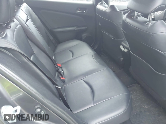 2019 Toyota Prius L Eco z VIN JTDKARFU7K3077941, wystawiony jako IAAI lot #41865759 z przebiegiem 254 612 mil mil oraz . Historia ofert i sprzedaży dostępna na DreamBid. Obrazek 8.
