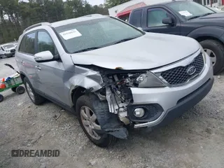 2011 Kia Sorento EX with VIN 5XYKU3A13BG032427, listed as a IAAI auction lot 41930043 with 301,883 mi miles. Bid and sale history available at carsss.com. Image 1.