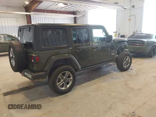 2021 Jeep Wrangler Unlimited Sahara z VIN 1C4HJXEN2MW592565, wystawiony jako IAAI lot #41956072 z przebiegiem 95 504 mil mil oraz . Historia ofert i sprzedaży dostępna na DreamBid. Obrazek 4.