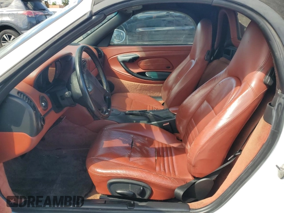 1999 Porsche Boxster z VIN WP0CA2984XU629987, wystawiony jako Copart lot #51366845 z przebiegiem Nie podano mil oraz Czysty tytuł • Clean title. Historia ofert i sprzedaży dostępna na DreamBid. Obrazek 7.