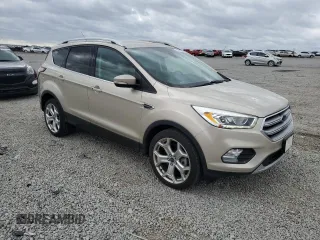 2017 Ford Escape Titanium with VIN 1FMCU0J98HUD75004, listed as a Copart auction lot 51627805 with 74,166 mi miles and Salvage Title. Bid and sale history available at carsss.com. Image 4.