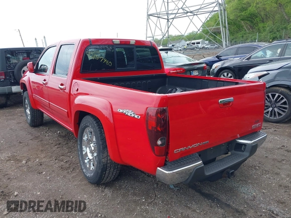 2012 GMC Canyon with VIN 1GTH5PFE3C8152571, listed as a IAAI auction lot 42157980 with 144,778 mi miles and . Bid and sale history available at DreamBid. Image 3.