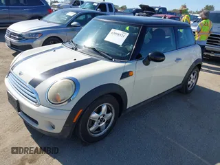 2010 MINI Hardtop with VIN WMWMF3C59ATZ66563, listed as a IAAI auction lot 42098521 with 153,734 mi miles and . Bid and sale history available at DreamBid. Image 2.