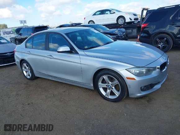 2013 BMW 3 Series 328i with VIN WBA3C1C52DF440786, listed as a IAAI auction lot 40777716 with 171,385 mi miles. Bid and sale history available at carsss.com. Image 1.
