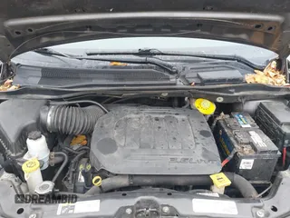 2019 Dodge Grand Caravan SXT with VIN 2C4RDGCGXKR723991, listed as a IAAI auction lot 40670679 with 174,387 mi miles and . Bid and sale history available at DreamBid. Image 10.
