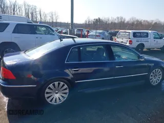 2004 Volkswagen Phaeton V8 z VIN WVWAF63D048009440, wystawiony jako IAAI lot #41495309 z przebiegiem 108 685 mil mil oraz . Historia ofert i sprzedaży dostępna na DreamBid. Obrazek 13.
