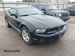 2011 Ford Mustang V6 with VIN 1ZVBP8AM5B5125342, listed as a IAAI auction lot 42206977 with 283,386 mi miles and . Bid and sale history available at DreamBid. Image 1.