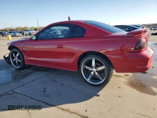 1996 Ford Mustang with VIN 1FALP4041TF234741, listed as a Copart auction lot 85277894 with 113,353 mi miles and Salvage Title. Bid and sale history available at carsss.com. Image 2.