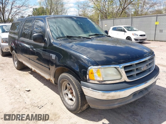 2003 Ford F-150 XLT with VIN 1FTRW07613KC71609, listed as a IAAI auction lot 42186741 with 190,591 mi miles. Bid and sale history available at carsss.com. Image 1.