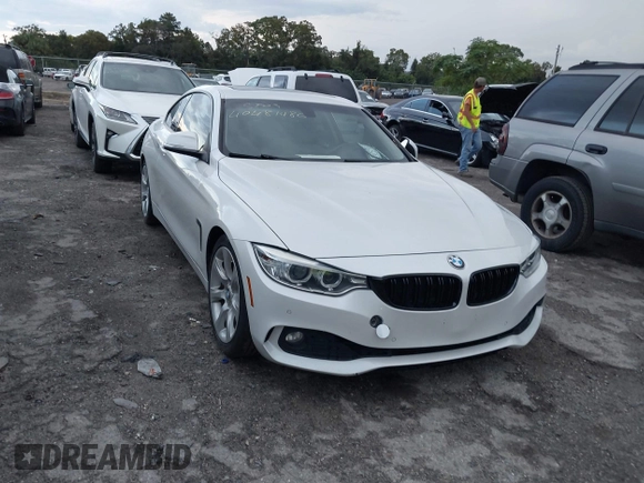 2015 BMW 4 Series 428i with VIN WBA3N3C54FK233803, listed as a IAAI auction lot 40481486 with 74,556 mi miles and . Bid and sale history available at DreamBid. Image 1.