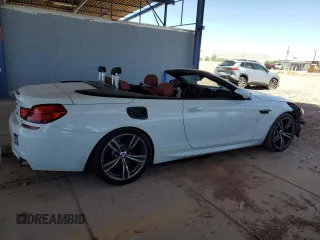 2013 BMW M6 с VIN WBSLZ9C59DDZ77823, выставлен на аукционе Copart как лот 62354225 с пробегом 74 704 миль миль и Списание • Salvage title. История ставок и продаж доступна на DreamBid. Изображение 3.
