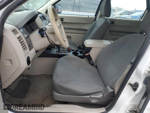 2008 Ford Escape XLS с VIN 1FMCU02Z58KB35743, выставлен на аукционе Copart как лот 54830015 с пробегом 166 643 миль миль и Списание • Salvage title. История ставок и продаж доступна на DreamBid. Изображение 7.