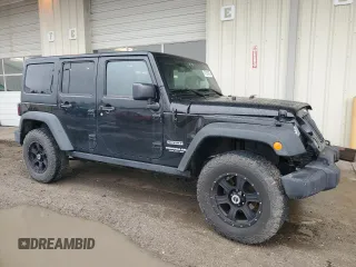 2014 Jeep Wrangler Unlimited Sport with VIN 1C4BJWDG2EL319714, listed as a Copart auction lot 47924575 with 129,294 mi miles and Salvage Title. Bid and sale history available at DreamBid. Image 4.
