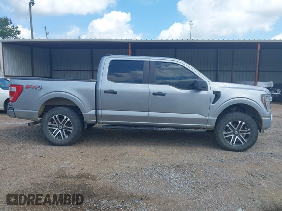 2023 Ford F-150 XL with VIN 1FTFW1E55PKE96110, listed as a IAAI auction lot 42127827 with 35,741 mi miles and . Bid and sale history available at DreamBid. Image 13.