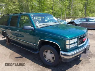 1997 GMC Suburban with VIN 3GKFK16R5VG508908, listed as a IAAI auction lot 42103068 with 264,446 mi miles and . Bid and sale history available at DreamBid. Image 1.