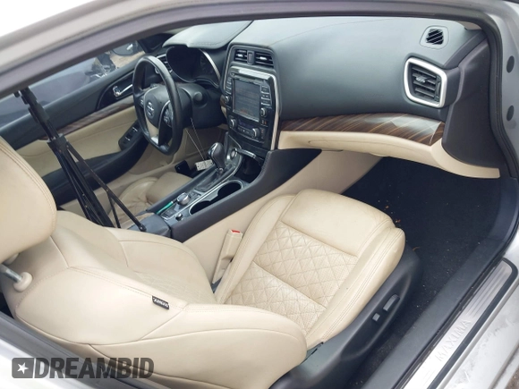2016 Nissan Maxima SL with VIN 1N4AA6AP2GC386239, listed as a IAAI auction lot 41871290 with 175,941 mi miles and . Bid and sale history available at DreamBid. Image 5.