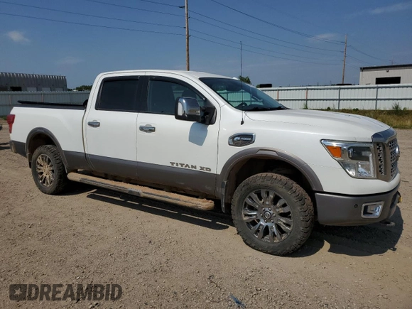 2016 Nissan Titan XD Platinum Reserve with VIN 1N6BA1F47GN511284, listed as a Copart auction lot 63860634 with 122,437 mi miles and Non Repairable. Bid and sale history available at carsss.com. Image 4.