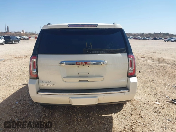 2015 GMC Yukon Denali with VIN 1GKS2CKJ3FR568729, listed as a IAAI auction lot 41741987 with 154,729 mi miles. Bid and sale history available at carsss.com. Image 16.