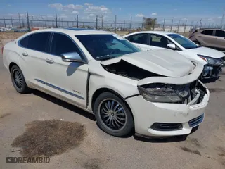 2014 Chevrolet Impala LTZ with VIN 2G1155S31E9258382, listed as a IAAI auction lot 41949581 with 100,101 mi miles. Bid and sale history available at carsss.com. Image 1.