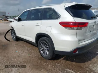 2019 Toyota Highlander SE with VIN 5TDKZRFH0KS557636, listed as a IAAI auction lot 42601100 with 107,922 mi miles and . Bid and sale history available at DreamBid. Image 3.