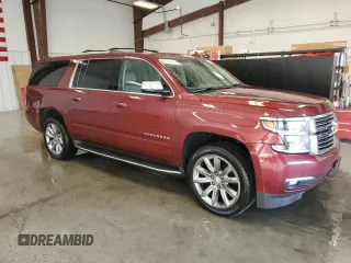 2019 Chevrolet Suburban Premier with VIN 1GNSKJKC6KR293389, listed as a Copart auction lot 77700264 with 49,057 mi miles and Salvage Title. Bid and sale history available at DreamBid. Image 4.