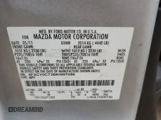 2011 Mazda Tribute Touring with VIN 4F2CY0C73BKM07056, listed as a Copart auction lot 85149404 with 138,265 mi miles and Salvage Title. Bid and sale history available at carsss.com. Image 14.
