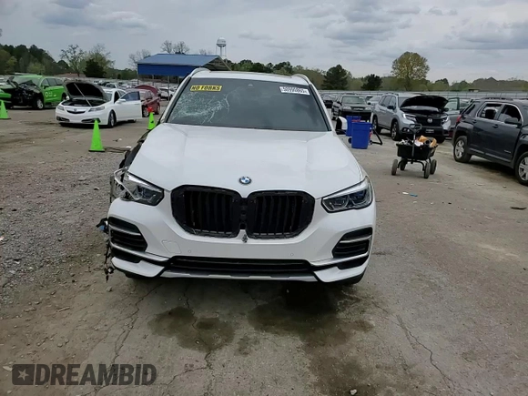 2022 BMW X5 xDrive40i with VIN 5UXCR6C01N9M26766, listed as a Copart auction lot 50990865 with 24,036 mi miles and Salvage Title. Bid and sale history available at DreamBid. Image 11.