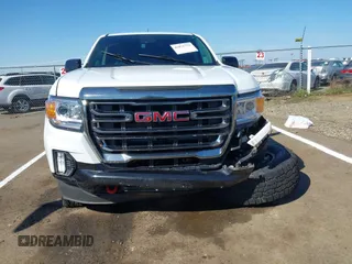 2021 GMC Canyon 4WD AT4 with VIN 1GTG6FEN8M1217042, listed as a IAAI auction lot 41871753 with 65,368 mi miles and . Bid and sale history available at carsss.com. Image 12.