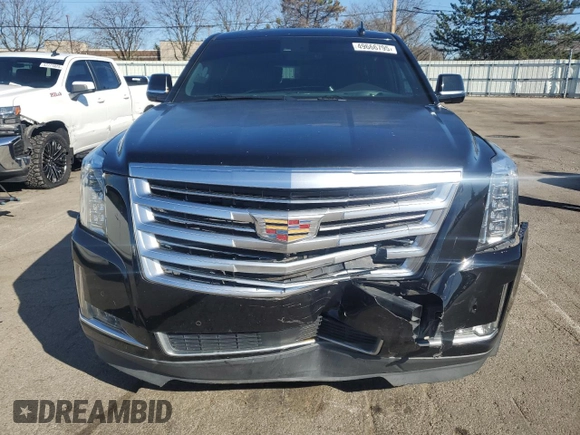 2015 Cadillac Escalade ESV Platinum z VIN 1GYS4UKJ7FR606162, wystawiony jako Copart lot #49666795 z przebiegiem 252 419 mil mil oraz Szkoda całkowita • Salvage title. Historia ofert i sprzedaży dostępna na DreamBid. Obrazek 5.